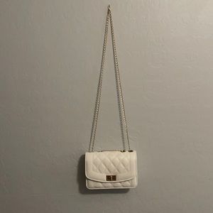 Gold chained white bag